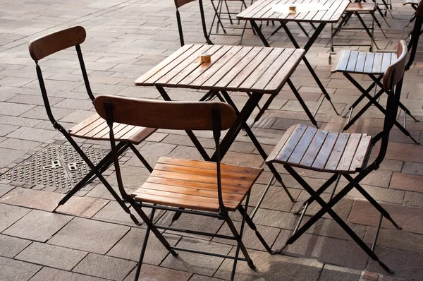 Terrace restaurant with wooden chairs — Stock Photo, Image