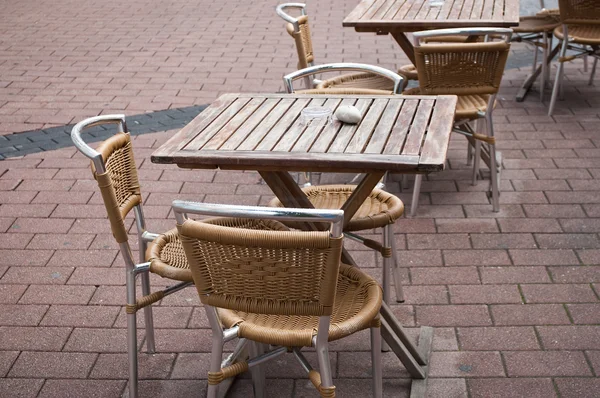 Terrace restaurant with wooden chairs — Stock Photo, Image