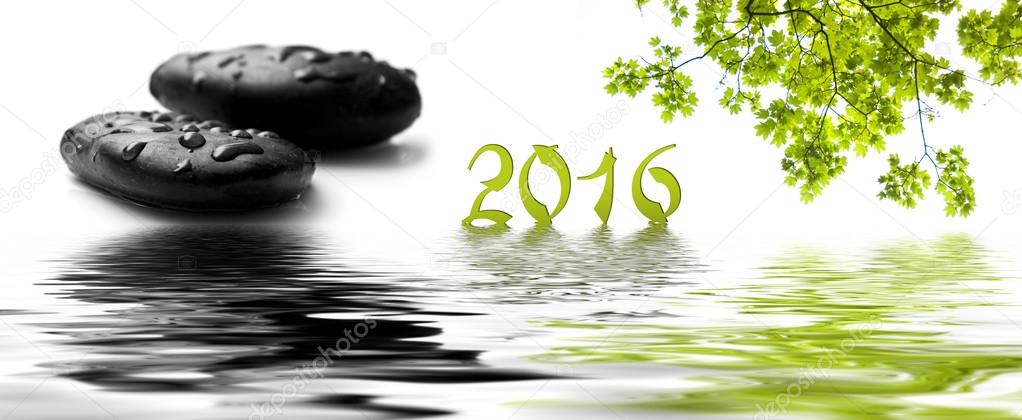 card happy new year 2016 with raindrops on black pebbles and maple tree in border water reflection