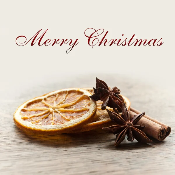 Chistmas card with sliced orange  dried anise and cinnamon — Stock Photo, Image