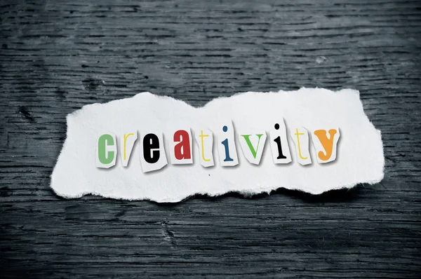 Concept creative message on wooden desk background - creativity — Stock Photo, Image