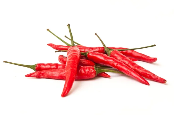 Group of red hot peppers on white background — Stock Photo, Image