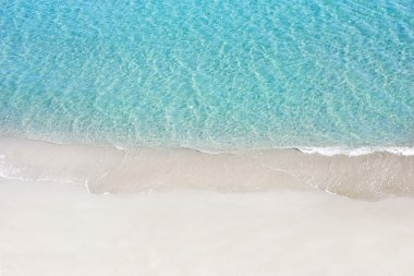 Beautiful white sand beach and tropical turquoise blue sea. View from above clipart