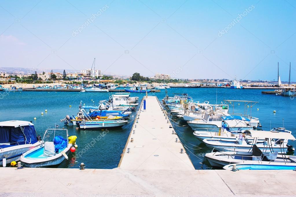 Yachts and boats in old port in Mediterranean sea