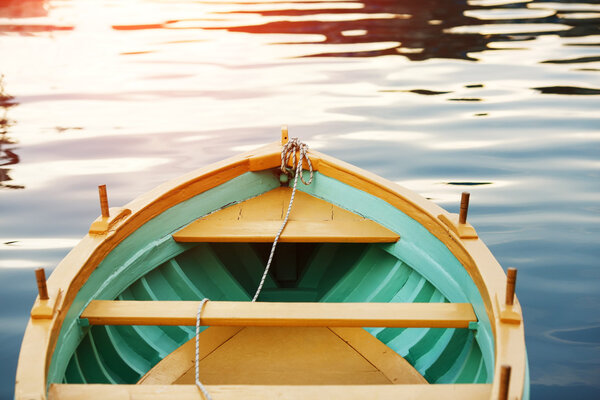 Wood Bow Deck of Wooden Boat. Sea sunset, sun glow.