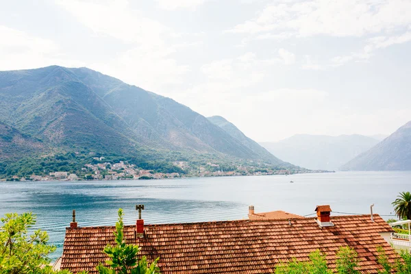 Harbor and ancient buildings in sunny day at Boka Kotor bay Montenegro, Europe. — Stock Photo, Image