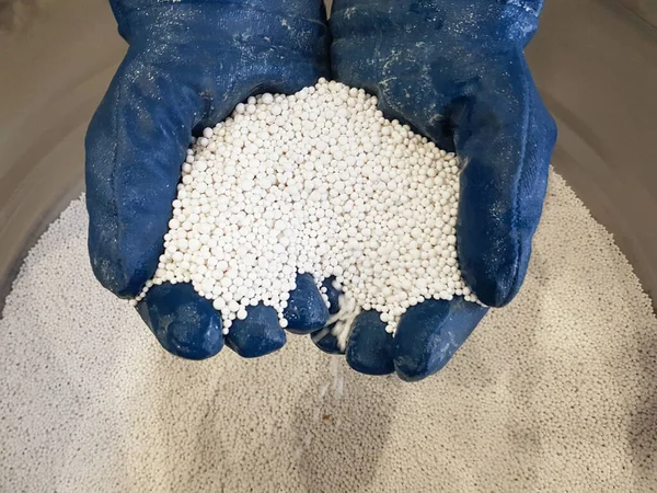 Alumogel and silica gel for drying gases and liquids. White alumogel and silica gel in your hands