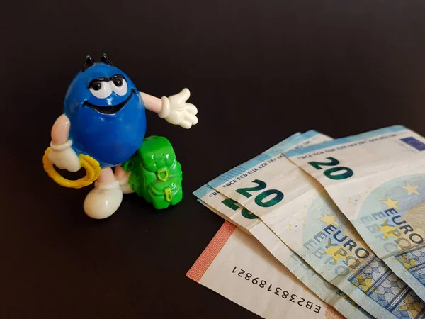 Juguete Azul Con Maletín Dinero Euros Sobre Fondo Negro Aislado —  Fotos de Stock