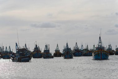 Balıkçıların köyü. Balık köyü Mui Ne, Vietnam, Asya 'da sepetinde geleneksel Vietnamlı teknesi