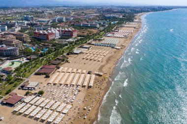 Aerial View Of The Beach On Turkish Riviera. Side, Mediterranean Sea Coast, Touristic Beach Antalya, Turkey drone photo view clipart