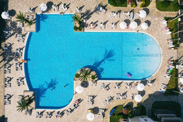 Aerial View Of swimming pool in hotel resort. Turkish Riviera. Side, Mediterranean Sea Coast, Antalya, Turkey drone photo view