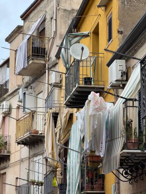 Collesano, a historic Sicilian mountain town in the Madonie Mountains, featuring narrow stone streets, traditional houses, and the Church of San Pietro, Sicily, Italy. Italian town in hills.