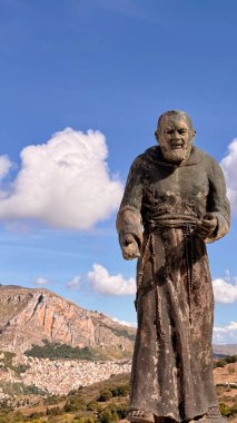 Sclafani Bagni, a small historic Sicilian mountain village perched on cliffs, featuring traditional stone houses, narrow streets, and panoramic views of the rugged Madonie Mountains, Sicily, Italy.