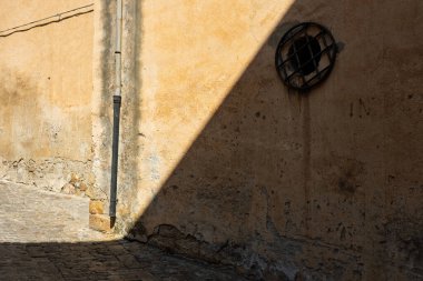 Castelbuono medieval town in the Madonie Mountains, Sicily, Italy, basking under the summer sun with historic streets, Ventimiglia Castle. Old mountain town in Sicily. Italian town in hills.