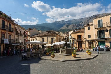 Castelbuono medieval town in the Madonie Mountains, Sicily, Italy, basking under the summer sun with historic streets, Ventimiglia Castle. Old mountain town in Sicily. Italian town in hills.