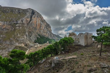 Caltavuturo, a historic Sicilian mountain town in the Madonie Mountains, featuring its medieval castle, charming narrow streets, and traditional stone houses, Sicily, Italy. Italian town in hills.