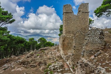 Caltavuturo, a historic Sicilian mountain town in the Madonie Mountains, featuring its medieval castle, charming narrow streets, and traditional stone houses, Sicily, Italy. Italian town in hills.
