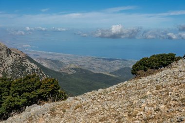 Red Trail on Pizzo Carbonara, the highest peak of Piano Battaglia, featuring panoramic mountain landscapes, rugged peaks, and scenic vistas in the Madonie Mountains, Sicily, Italy Carbonara mountain.