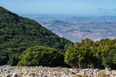 Red Trail on Pizzo Carbonara, the highest peak of Piano Battaglia, featuring panoramic mountain landscapes, rugged peaks, and scenic vistas in the Madonie Mountains, Sicily, Italy Carbonara mountain.