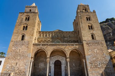 Cefalu, a historic Sicilian coastal town in northern Sicily, Italy, charming narrow streets, the Cathedral Basilica of the Transfiguration of the Lord, golden beach, and view of the Tyrrhenian Sea.