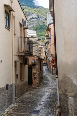Collesano, a historic Sicilian mountain town in the Madonie Mountains, featuring narrow stone streets, traditional houses, and the Church of San Pietro, Sicily, Italy. Italian town in hills.