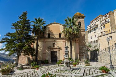 Sclafani Bagni, a small historic Sicilian mountain village perched on cliffs, featuring traditional stone houses, narrow streets, and panoramic views of the rugged Madonie Mountains, Sicily, Italy.