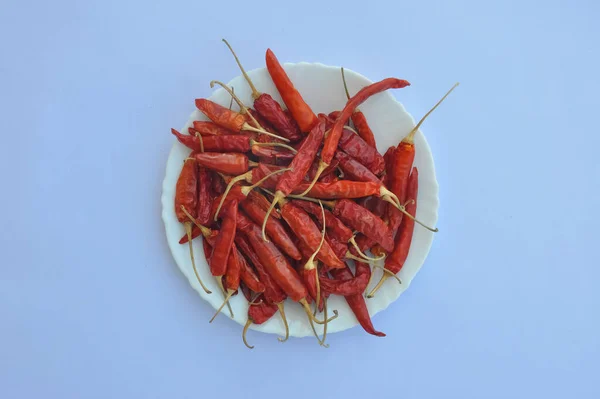 High Angle View Dry Red Chilli Peppers White Plate Isolated — Stockfoto