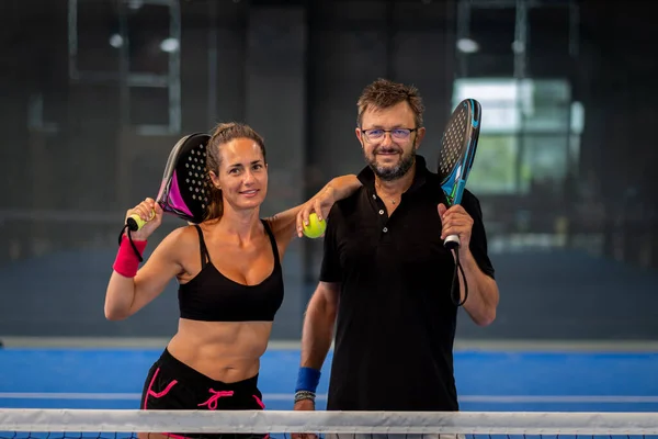 Portrait Two Smiling Sportsman Posing Indoor Padel Court Rackets Balls — Stok fotoğraf