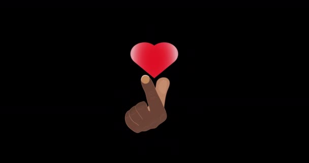 黒い男の手が指をスナップし 鼓動する心臓が現れます 愛する人へのメッセージのように飛び去るのです — ストック動画