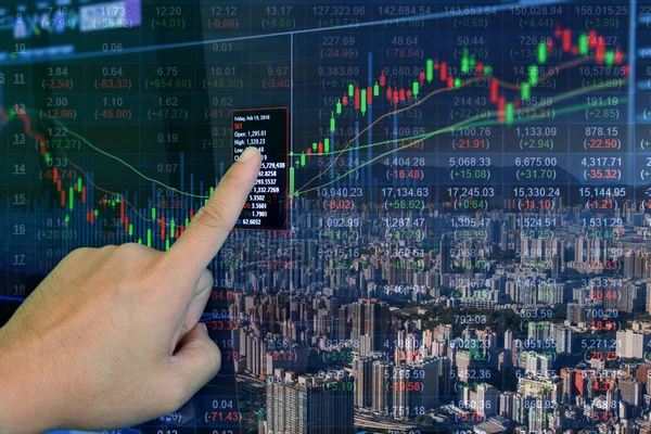 Double exposure of stocks market chart in blue on LED display concept with city scape hong kong background — Stock Photo, Image