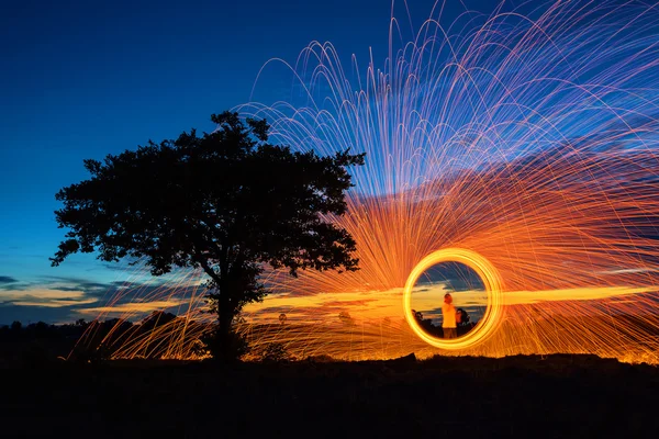 Ring of Fire, Burning steel wool spin near a tree