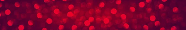 Bokeh borroso multicolor sobre un fondo rojo — Vector de stock