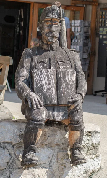 Predjama Slovenia August 2021 Wooden Sculpture Soldier Sitting Wall Close — Stock Photo, Image