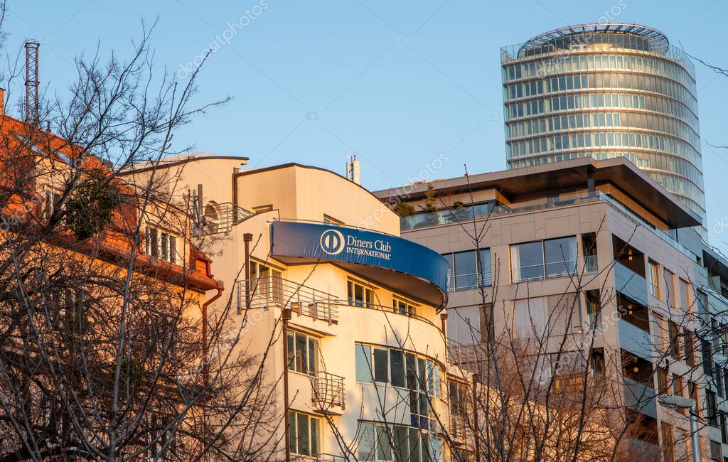 Bratislava, Slovakia - February, 22, 2025 : Diners Club International sign on the building . Diners Club International is a charge card company owned by Capital One.