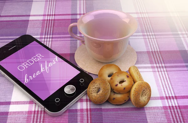 Мобильный телефон с текстом для завтрака — стоковое фото