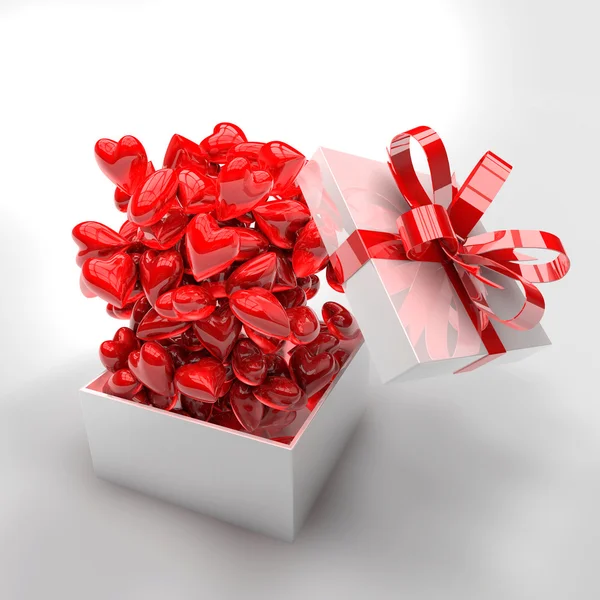 Present box with hearts — Stock Photo, Image