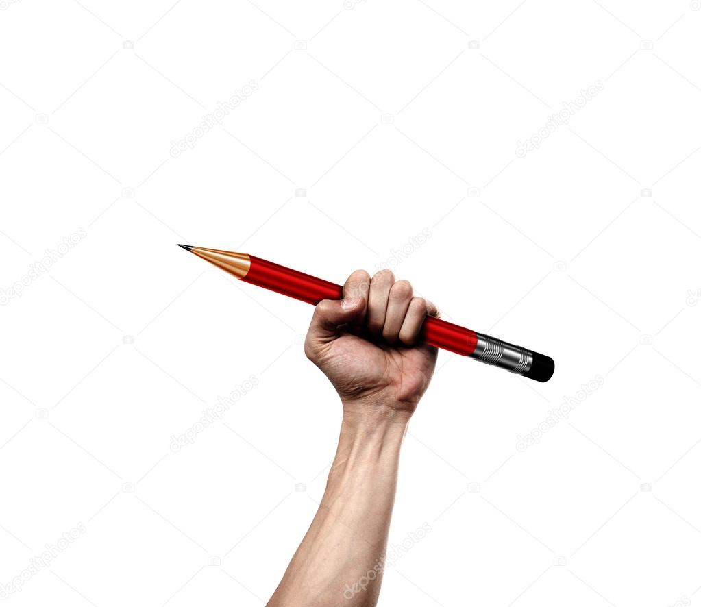 Hand holding pencil as a symbol of  shooting cartoon artists in France