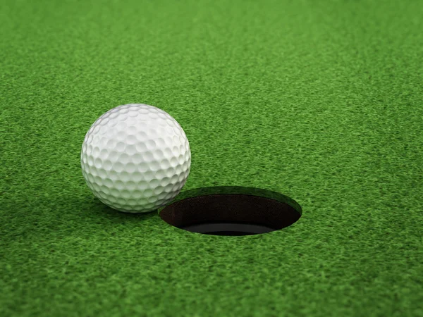 Golf bal staande in de buurt van de hole — Stockfoto