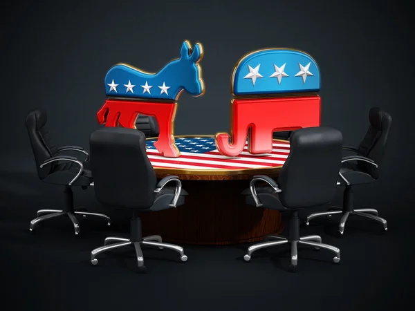 USA Political party symbols standing on American flag covered table — Stock Photo, Image