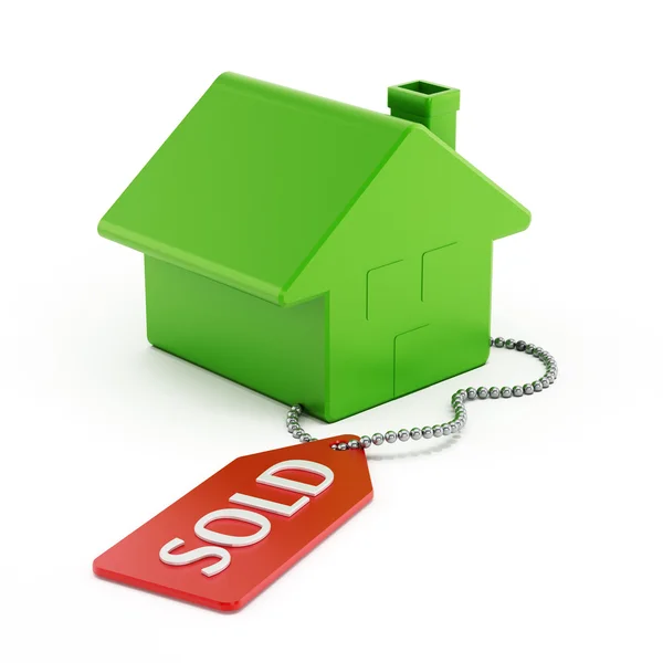 Plastic house with sold tag — Stock Photo, Image