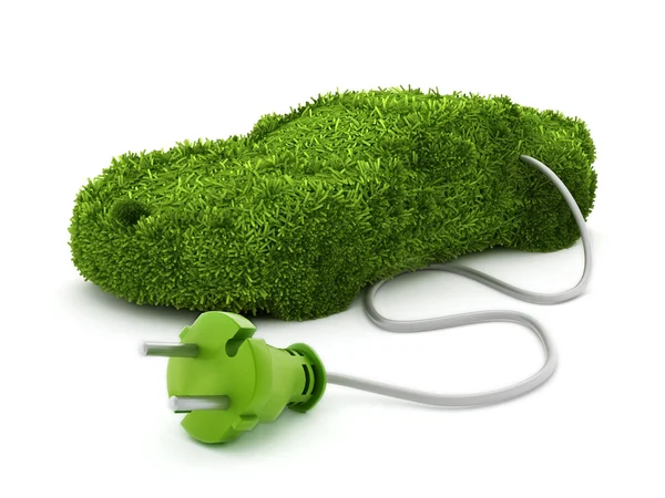 Carro verde coberto com textura de grama conectado ao plugue elétrico — Fotografia de Stock