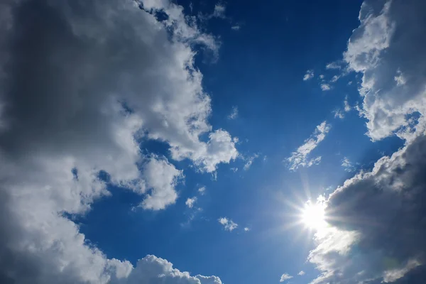 clear weather sky, sun on blue sky with clouds, sun rays