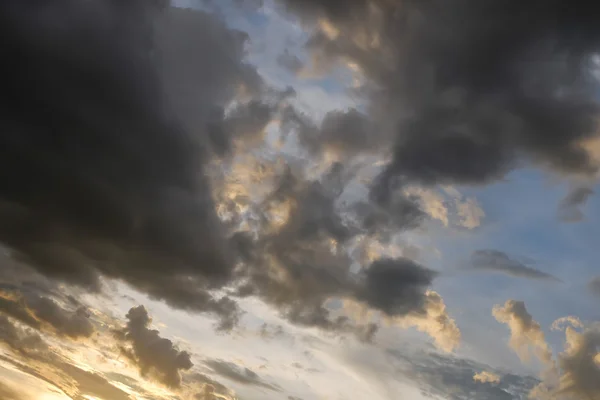 black cloud on sunset dramatic dark sky background