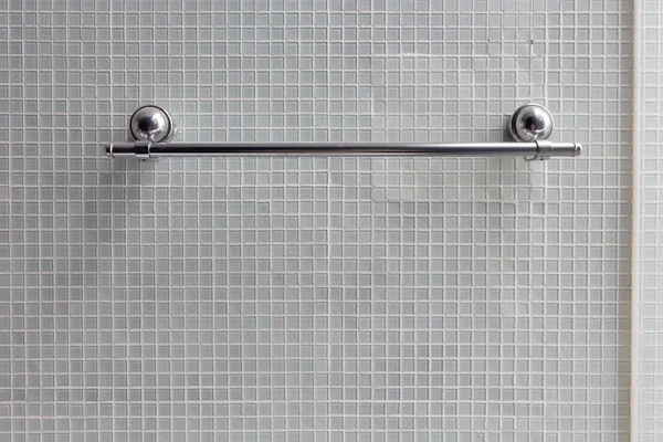 Bathroom, stainless steel towel rail in bathroom with mosaic — Stock Photo, Image