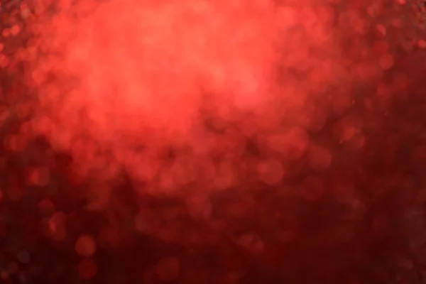 Красный фон, абстрактное размытие боке света — стоковое фото