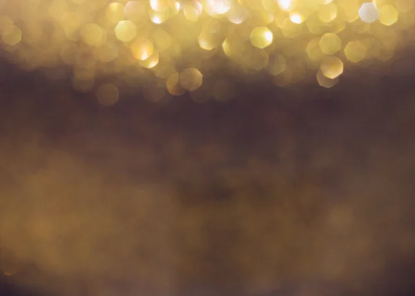 Gold bakgrund, abstrakt gyllene bokeh ljus firandet — Stockfoto