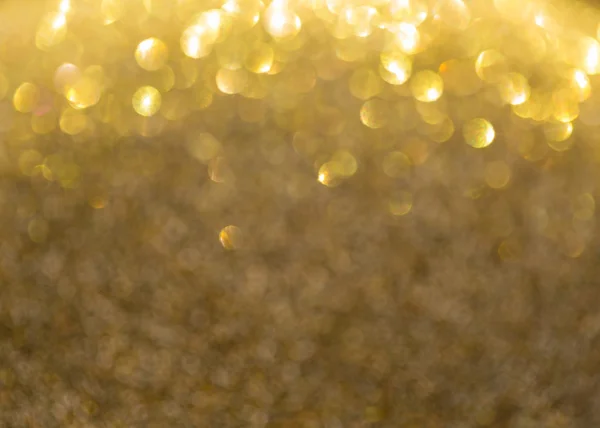 Fondo dorado, celebración abstracta de luz bokeh dorada —  Fotos de Stock