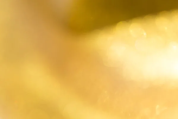 Gold bakgrund, abstrakt gyllene bokeh ljus firandet — Stockfoto