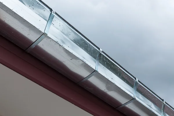 Gutter roof on house in rainy day — Stock Photo, Image