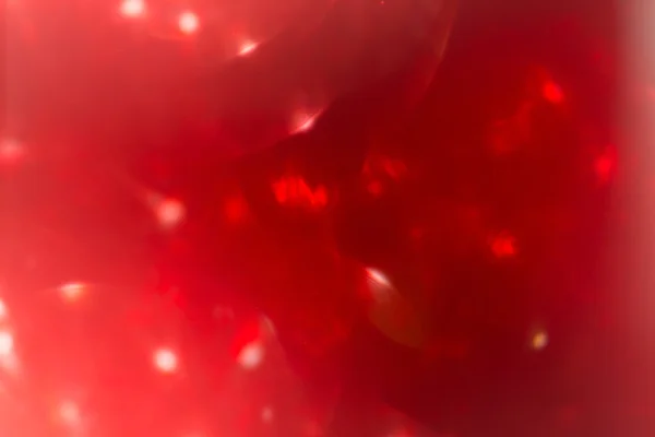Röd bakgrund, abstrakt bokeh ljus firandet oskärpa bakgrund — Stockfoto